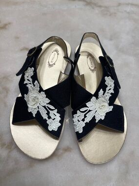 Joyfolie Arie Black Sandals with White Floral Appliqué